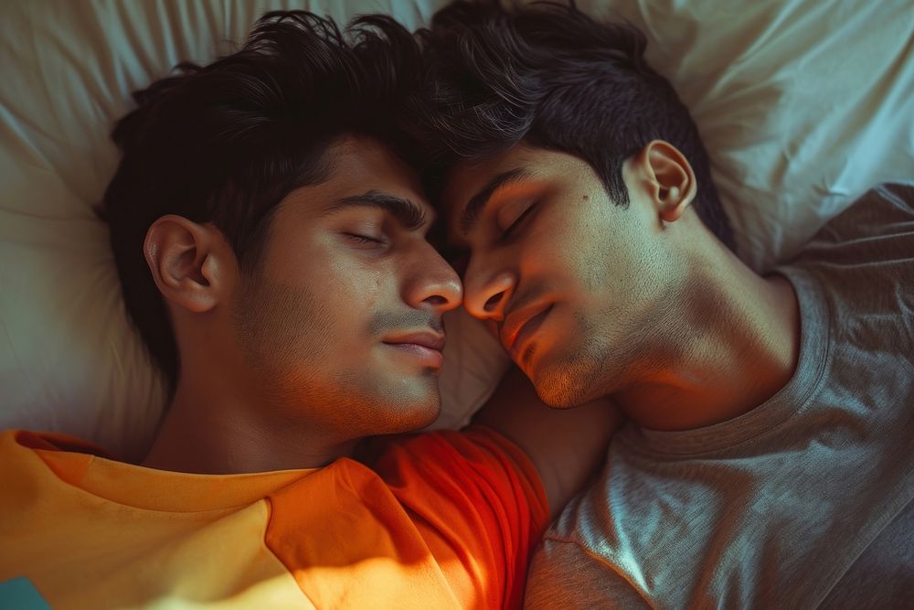Indian young male couple kissing adult love.
