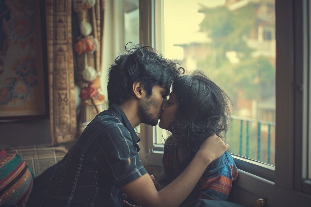 Indian young male couple kissing love head.