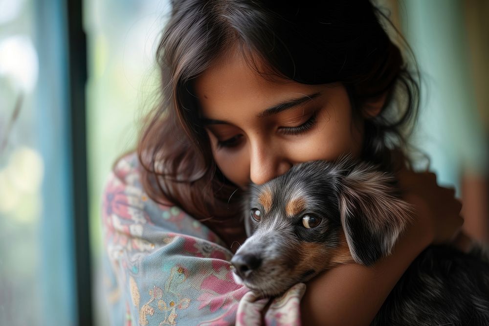 Indian young female hugging a dog portrait animal mammal.