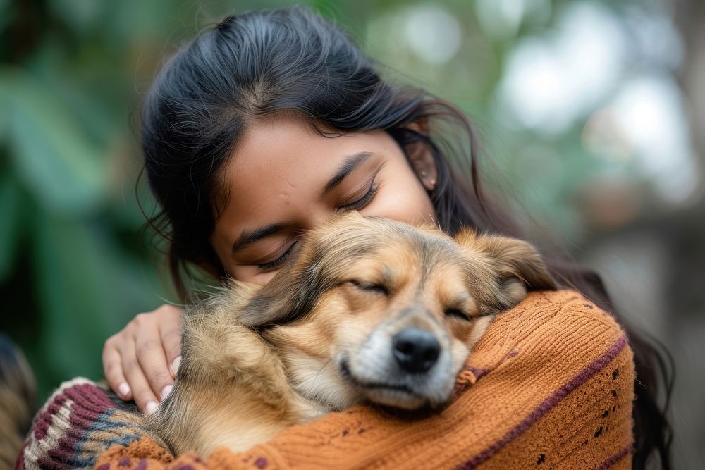 Indian young female hugging a dog portrait love affectionate.