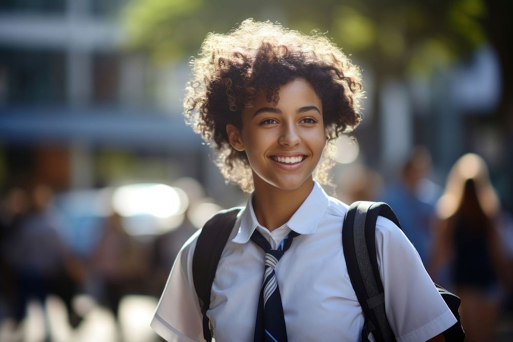 Brazilian young student wearing uniform sunlight smile adult.