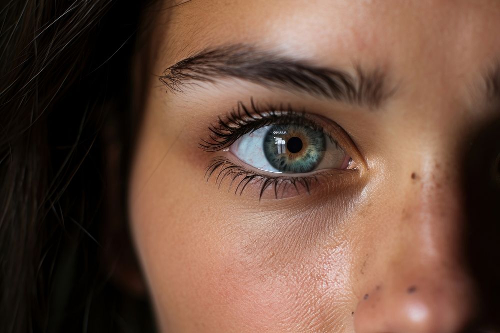 Woman with black eyes portrait looking adult. 