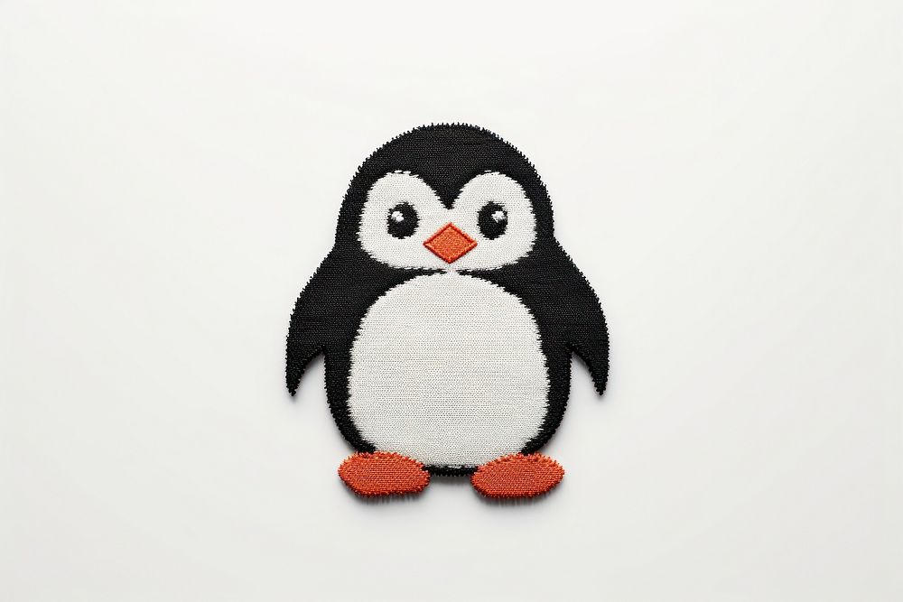 Penguin in embroidery style textile animal white.