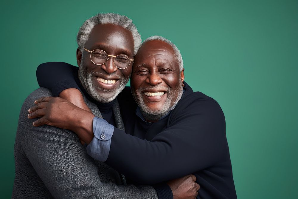 Black senior man and friend hugging adult love togetherness.