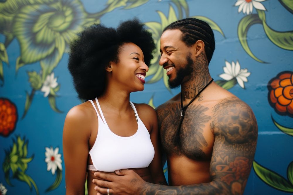 Black couple laughing portrait smiling.