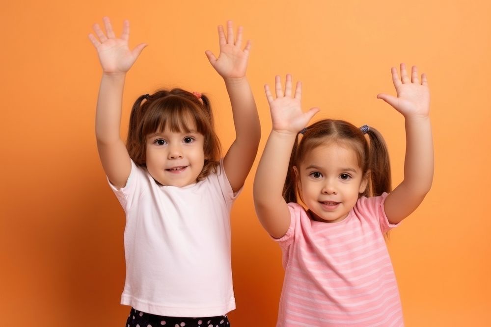Little children friends hands up portrait togetherness photography. AI generated Image by rawpixel.
