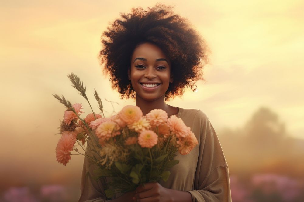 Black woman holding bouquet flower portrait smiling adult.