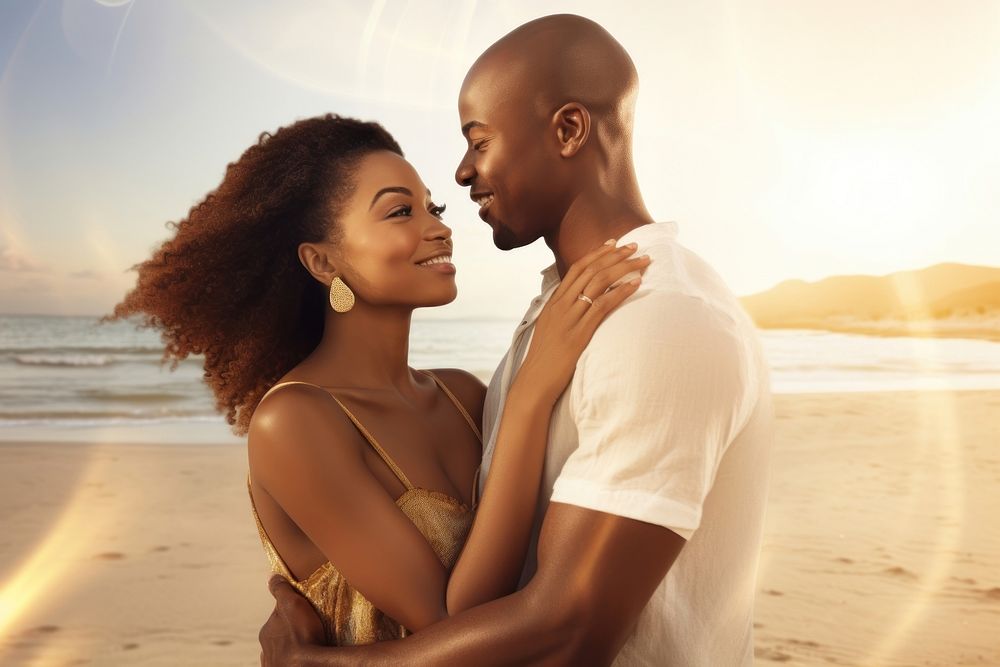 Black couple portrait embracing beach.