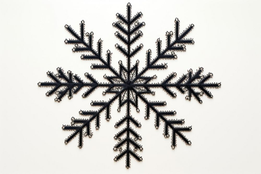 Black snowflake in embroidery style creativity decoration christmas.