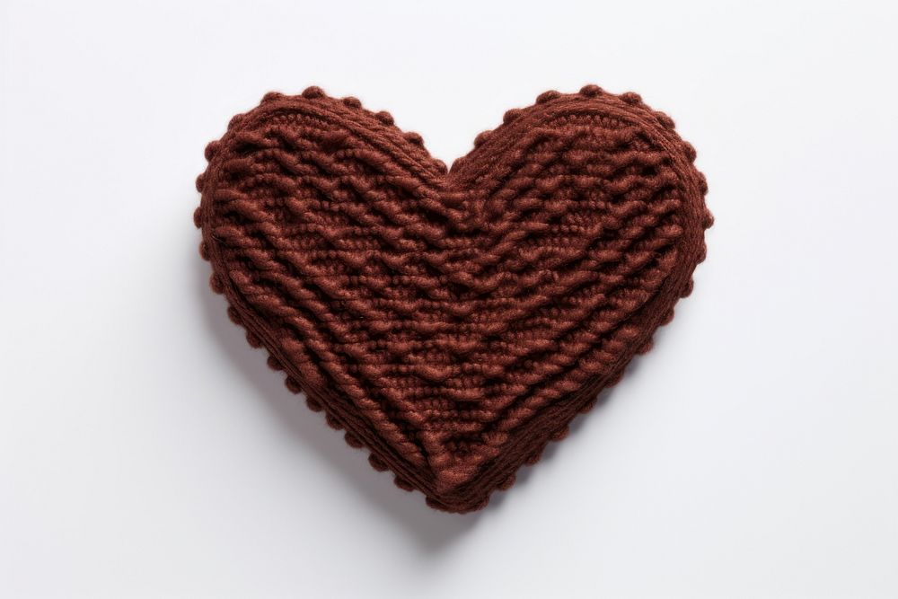 Heart chocolate in embroidery style textile creativity softness.