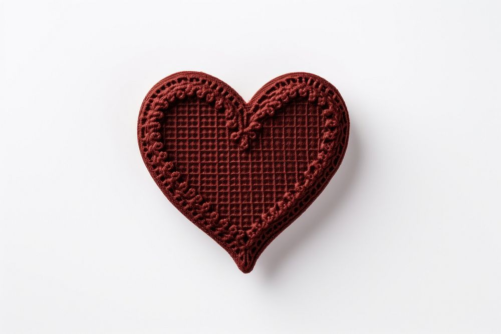 Heart chocolate in embroidery style textile pattern symbol.