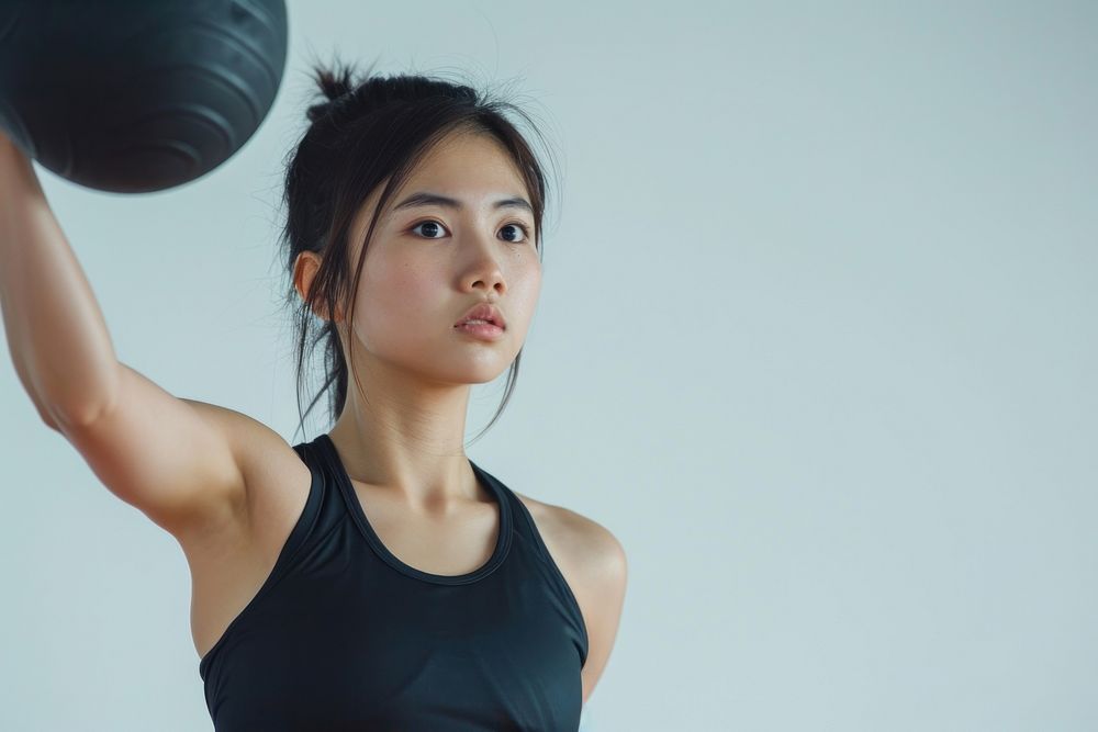 Asian woman in black top exercise portrait adult photo.