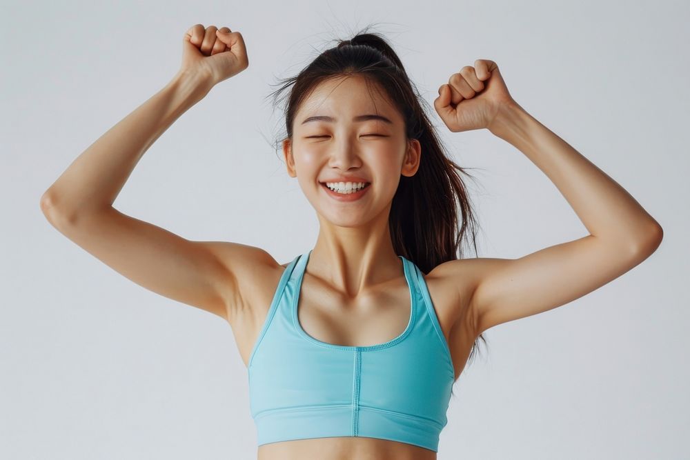 Asian woman in soft blue top exercise smile adult determination.