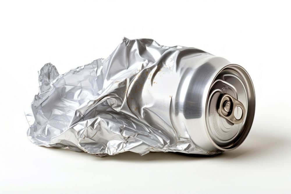 A Crumpled empty blank soda or beer can garbage crumpled white background aluminium.