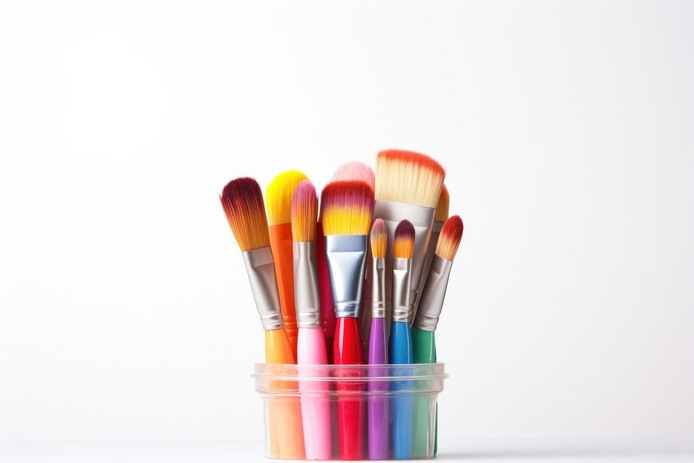Stack of color artist paint brushes tool white background paintbrush.