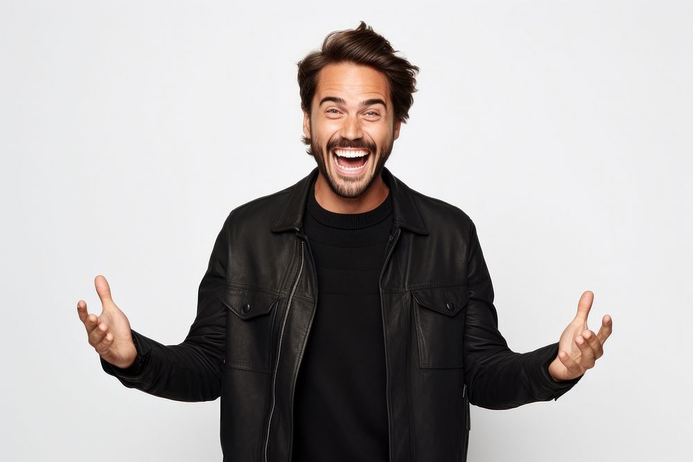 Young caucasian handsome man surprised and smiley Raise your hand laughing adult white background.
