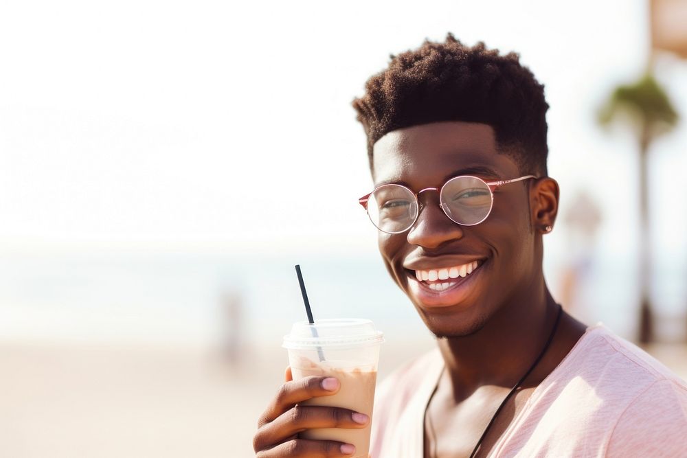 Young African American man glasses smiling summer.