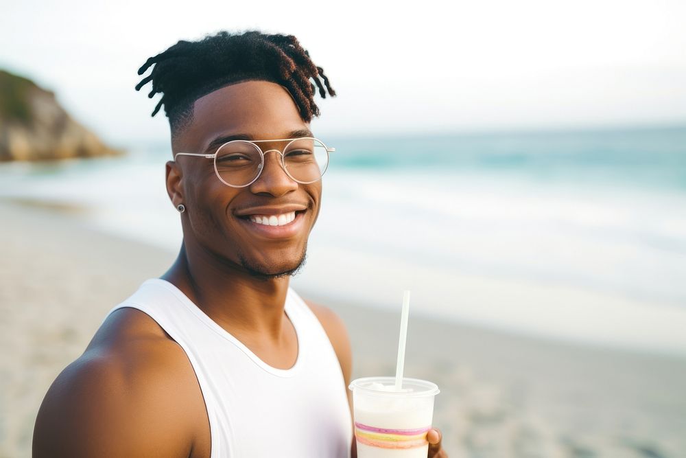 Young African American man glasses portrait smiling.