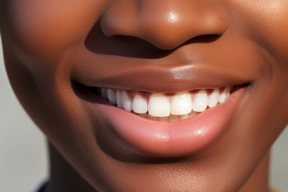 Smiling lips of black people teeth skin perfection.
