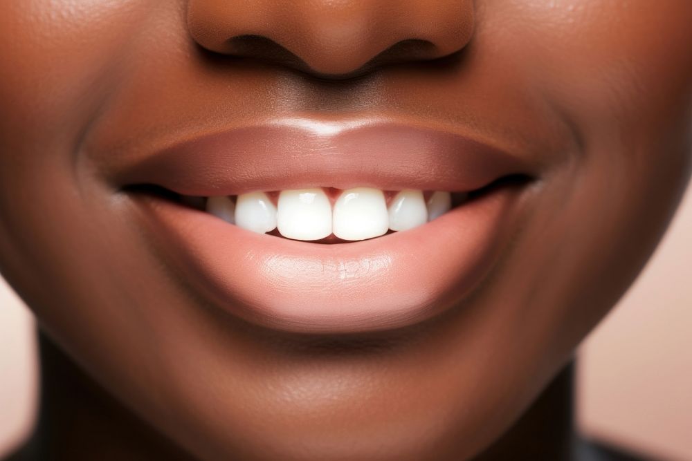 Smiling lips of black people skin teeth smile.