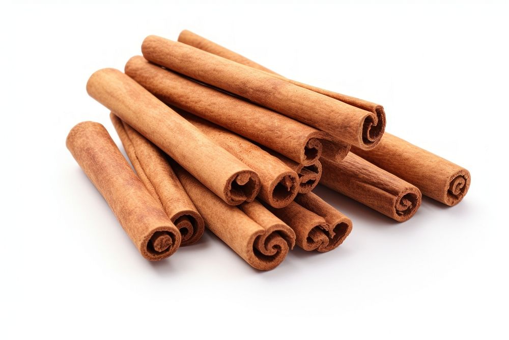 Fragrant cinnamon sticks food wood white background.