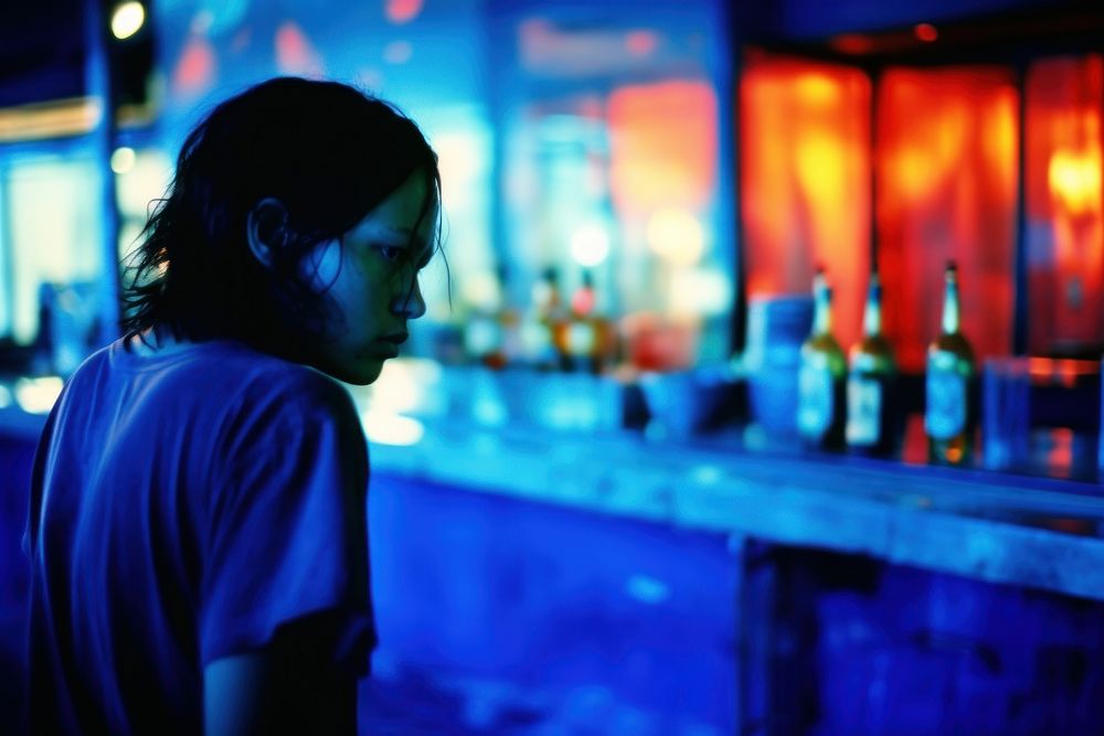 Lonely girl in bar adult drink blue.