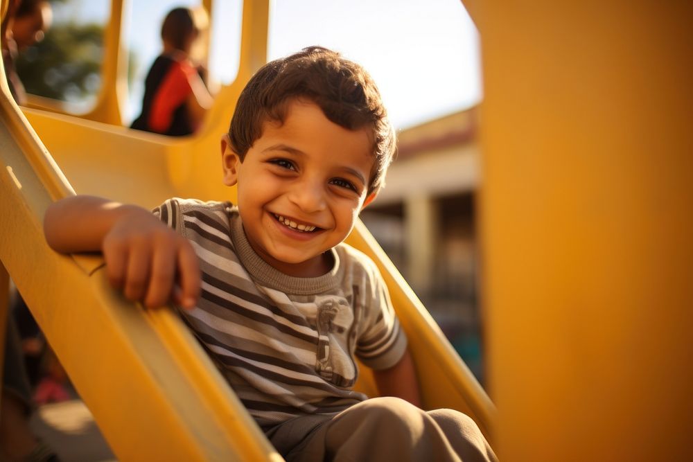Palestinian kid playground portrait outdoors.