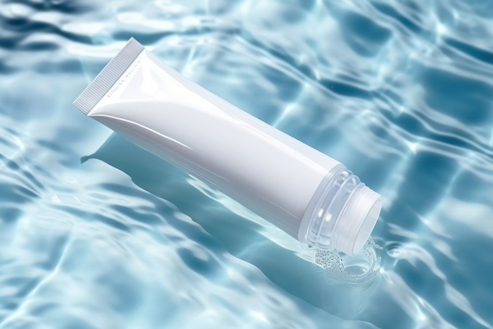  White cream tube underwater toothpaste cosmetics. AI generated Image by rawpixel.