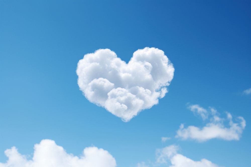 A heart shaped is a altocumulus cloud sky outdoors nature.