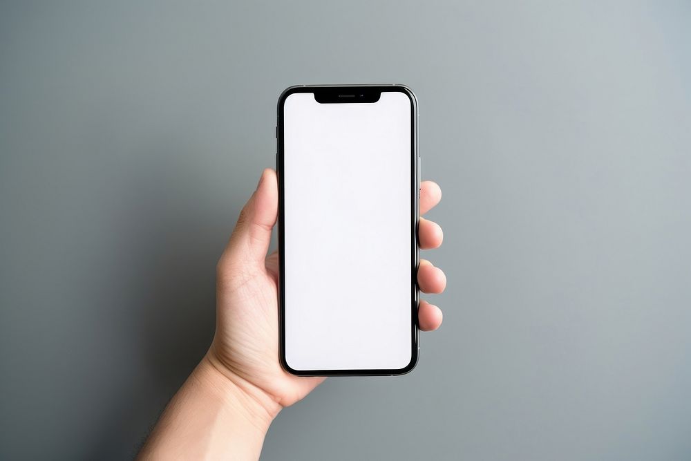  Phone technology holding finger. AI generated Image by rawpixel.