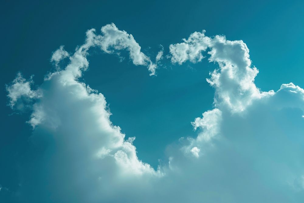 Cloud have a hole as a heart shaped sky backgrounds outdoors.