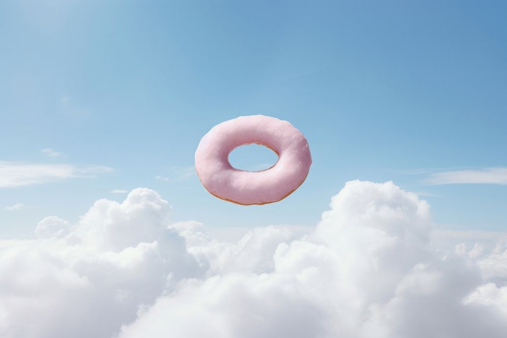 Donut shaped cloud in the sky outdoors nature food.