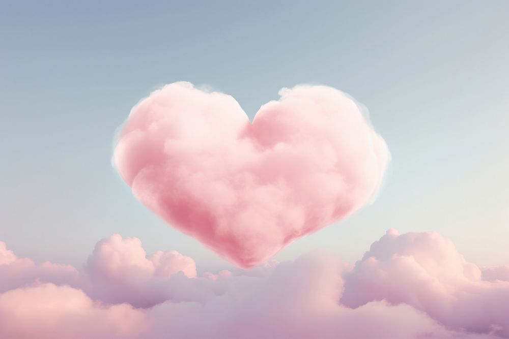 Heart shaped as a cloud in the pink sky background backgrounds tranquility landscape.
