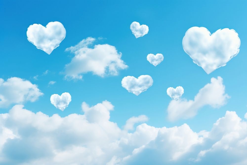 Hearts shaped clouds in the blue sky backgrounds outdoors nature.