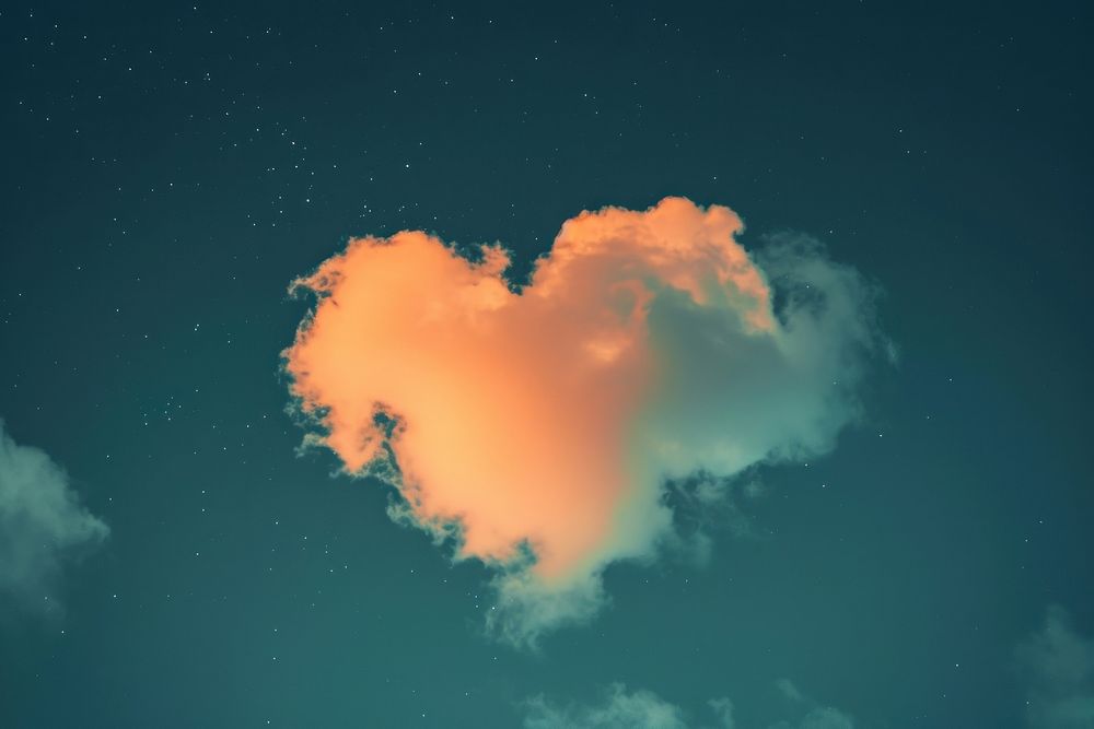 Hearts shaped clouds in the night sky outdoors nature tranquility.