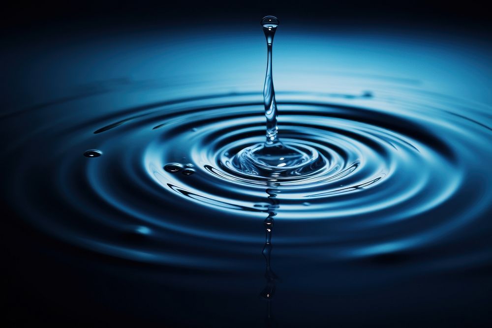 Drop of water ripple blue backgrounds. AI generated Image by rawpixel.