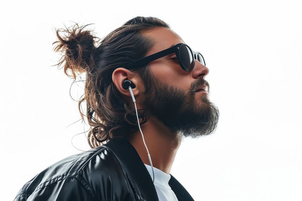 A man with bun hair beard sunglasses listening.