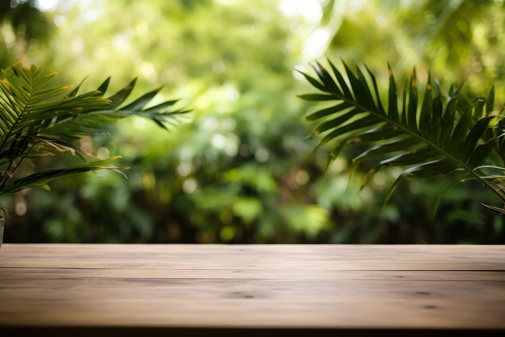 Tropical leaves table outdoors nature. AI generated Image by rawpixel.
