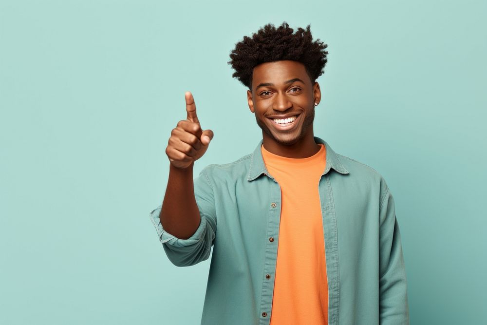 African american man pointing smiling finger. AI generated Image by rawpixel.