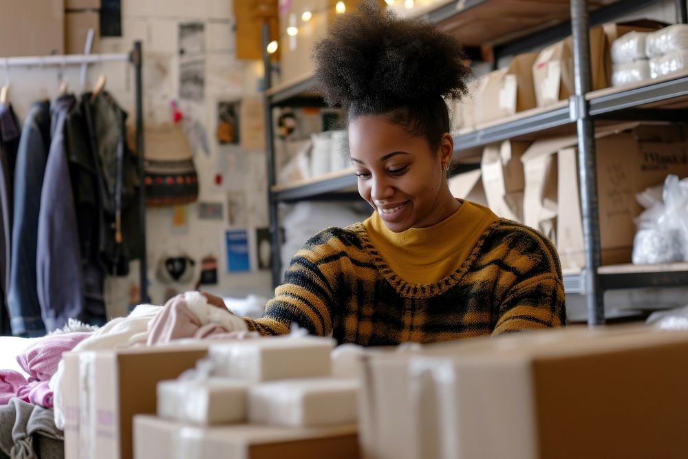 African american woman box small business concentration.