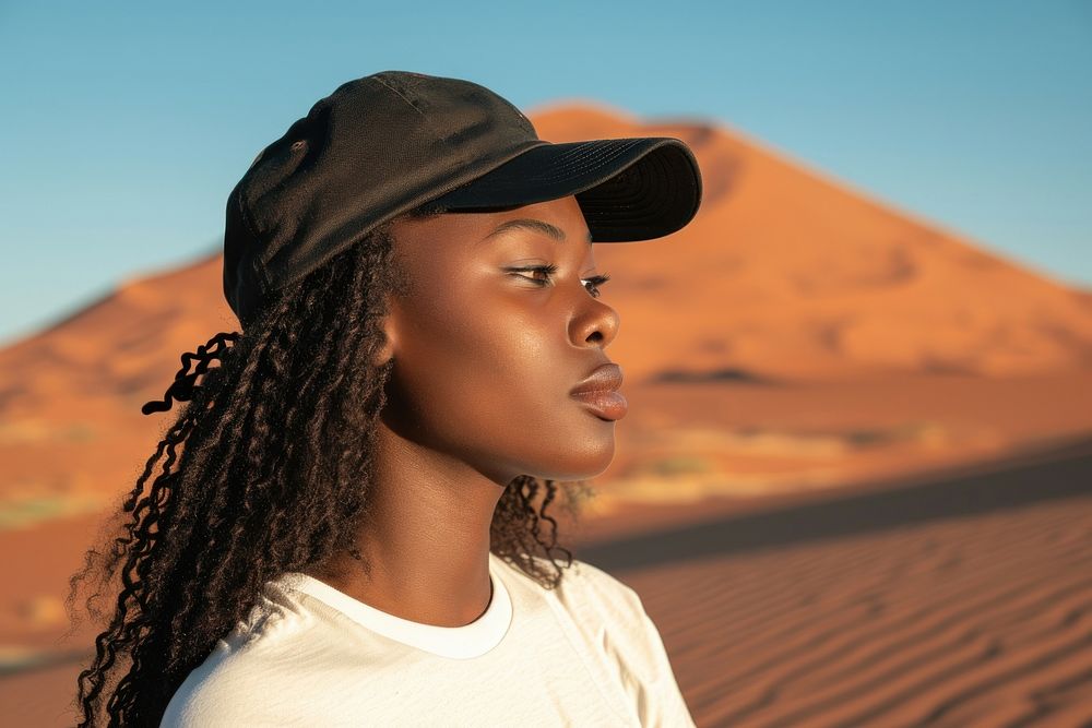 Minimalist cap portrait outdoors desert.