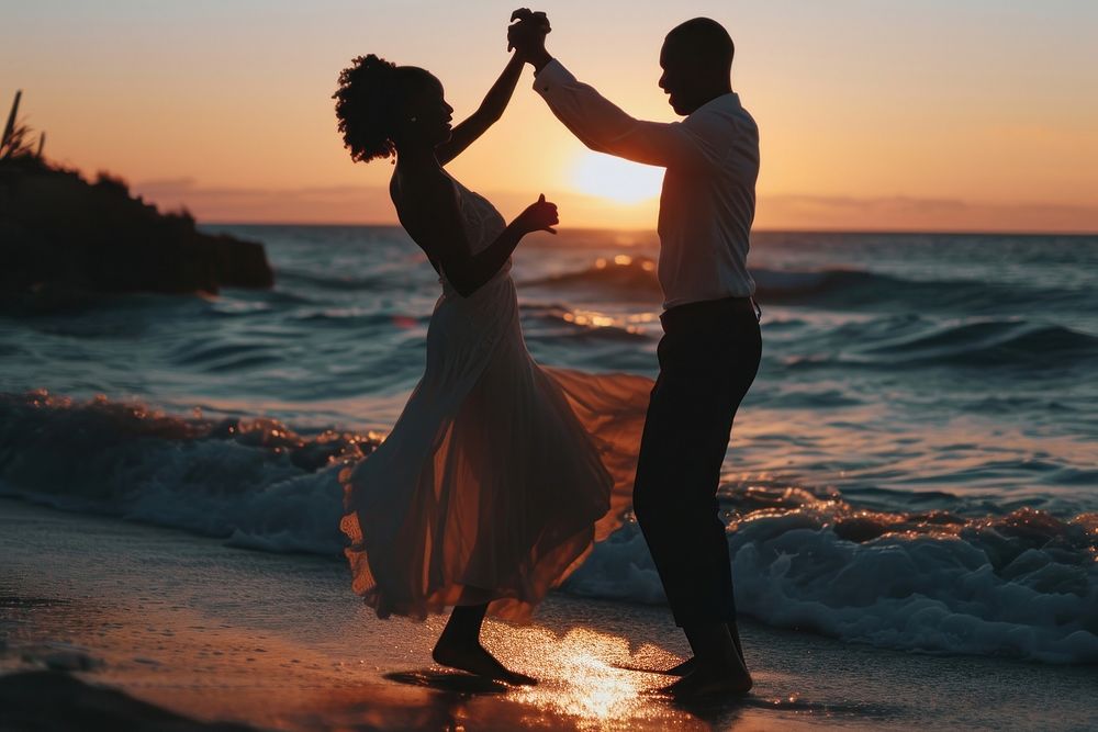 Black couple dancing beach outdoors wedding. AI generated Image by rawpixel.