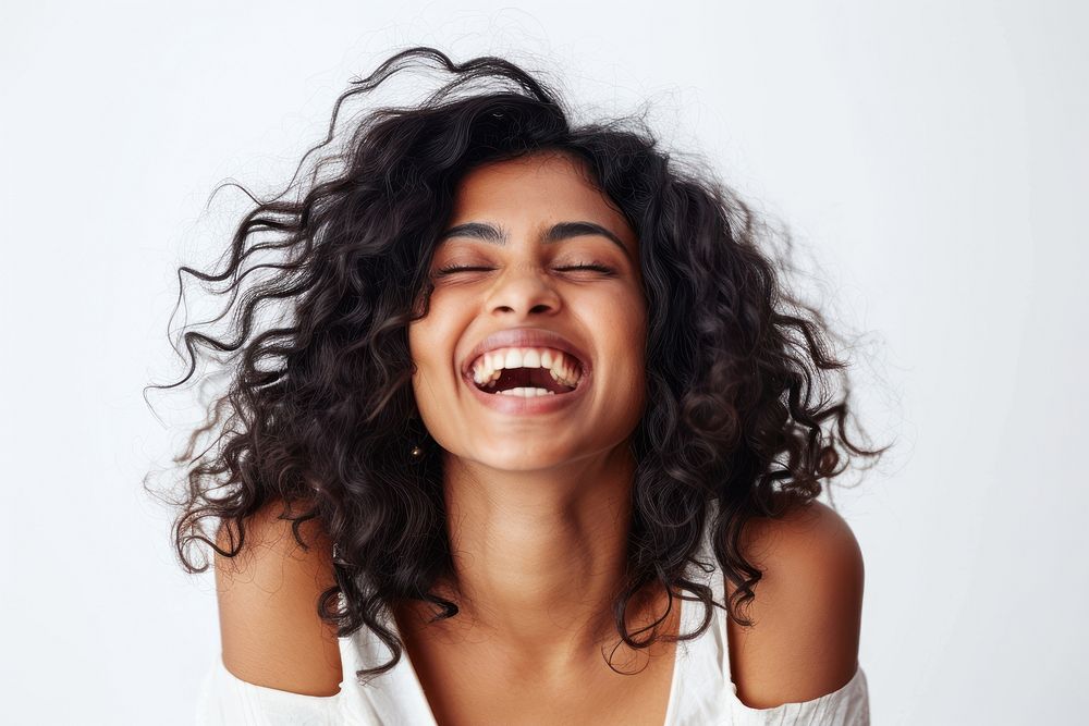 Indian woman with white top laughing adult face white background.