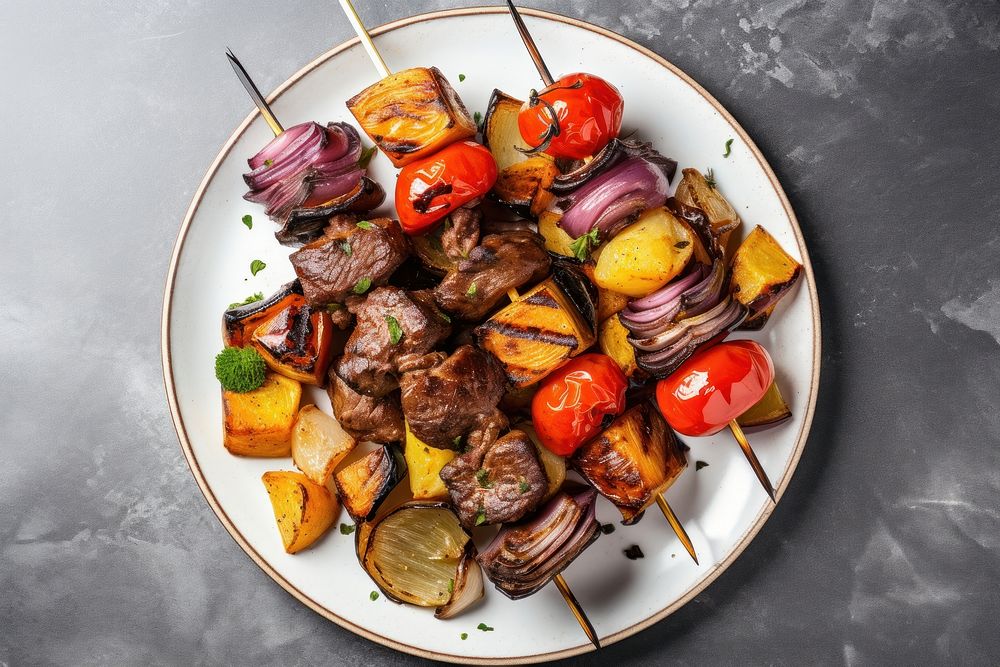 Kebabs grilled meat and vegetables plate food meal.