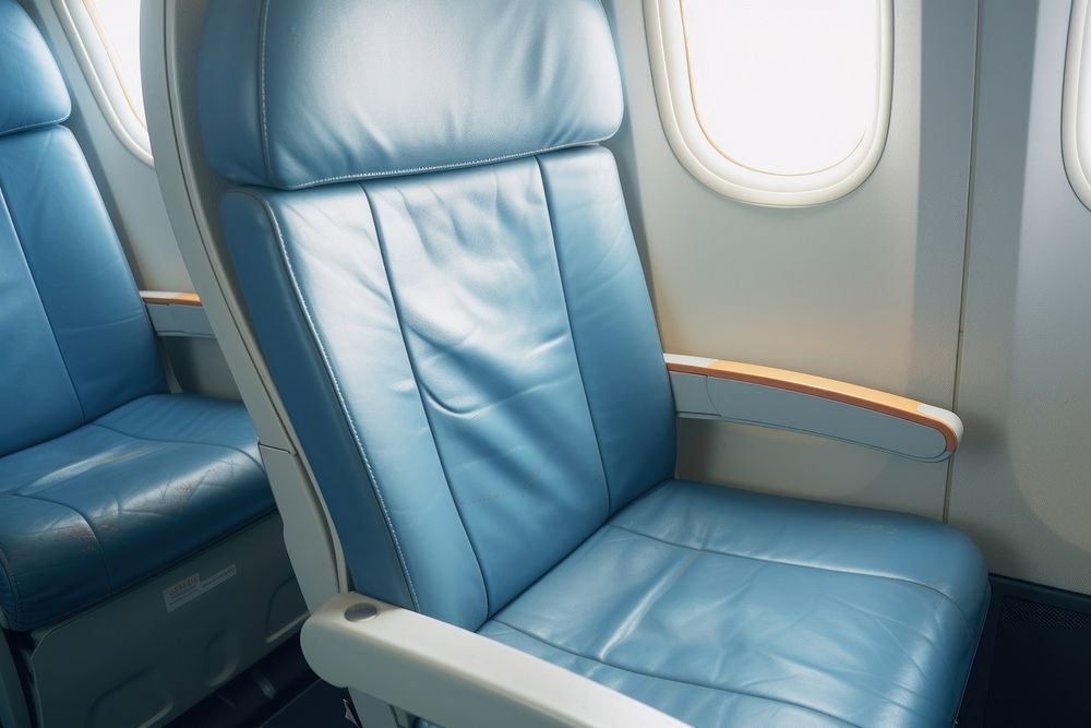 Airplane seat furniture vehicle chair.