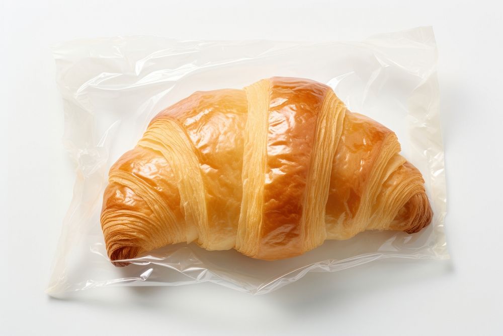 A croissant bread food white background.