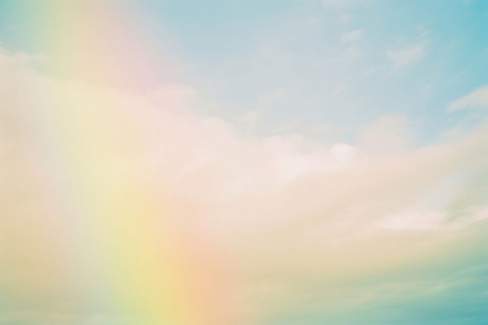 A rainbow in the sky outdoors nature vibrant color. AI generated Image by rawpixel.