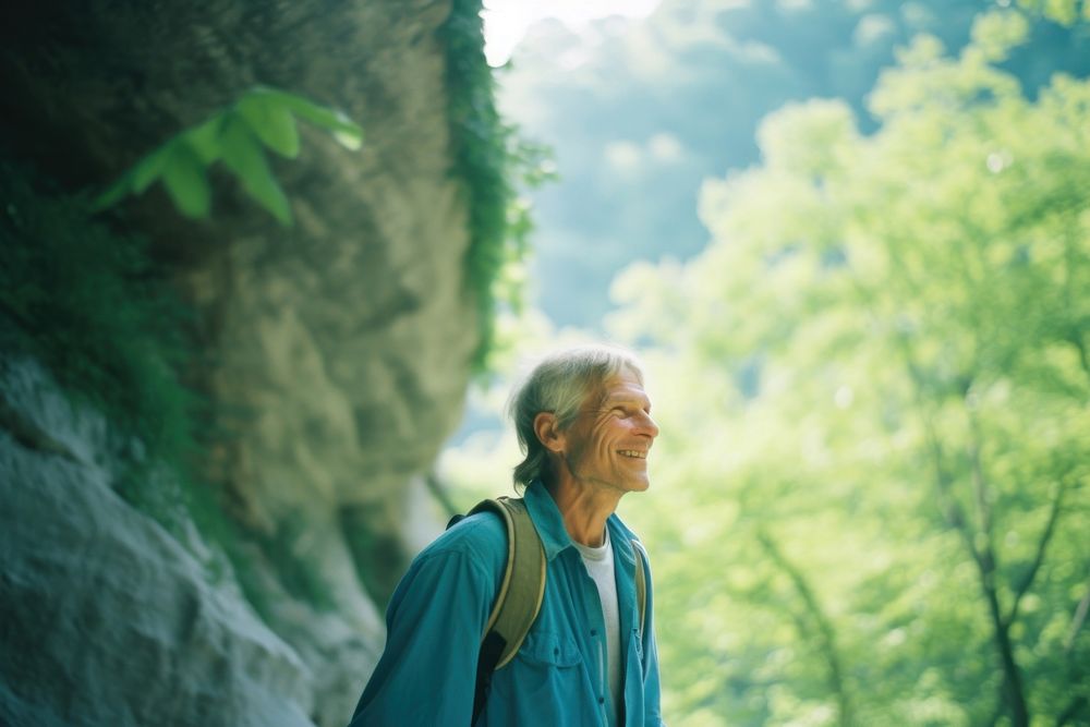 An elder hiking photography portrait plant. AI generated Image by rawpixel.