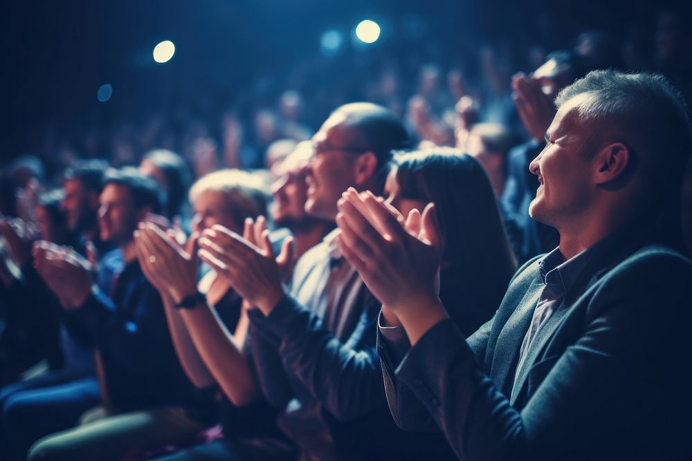 Audience clapping hands during event adult togetherness performance. AI generated Image by rawpixel.