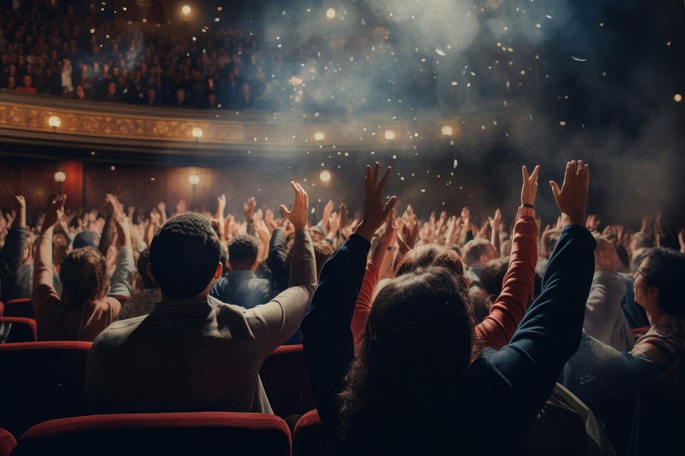 Crowd of people applauding at theater concert adult togetherness. AI generated Image by rawpixel.